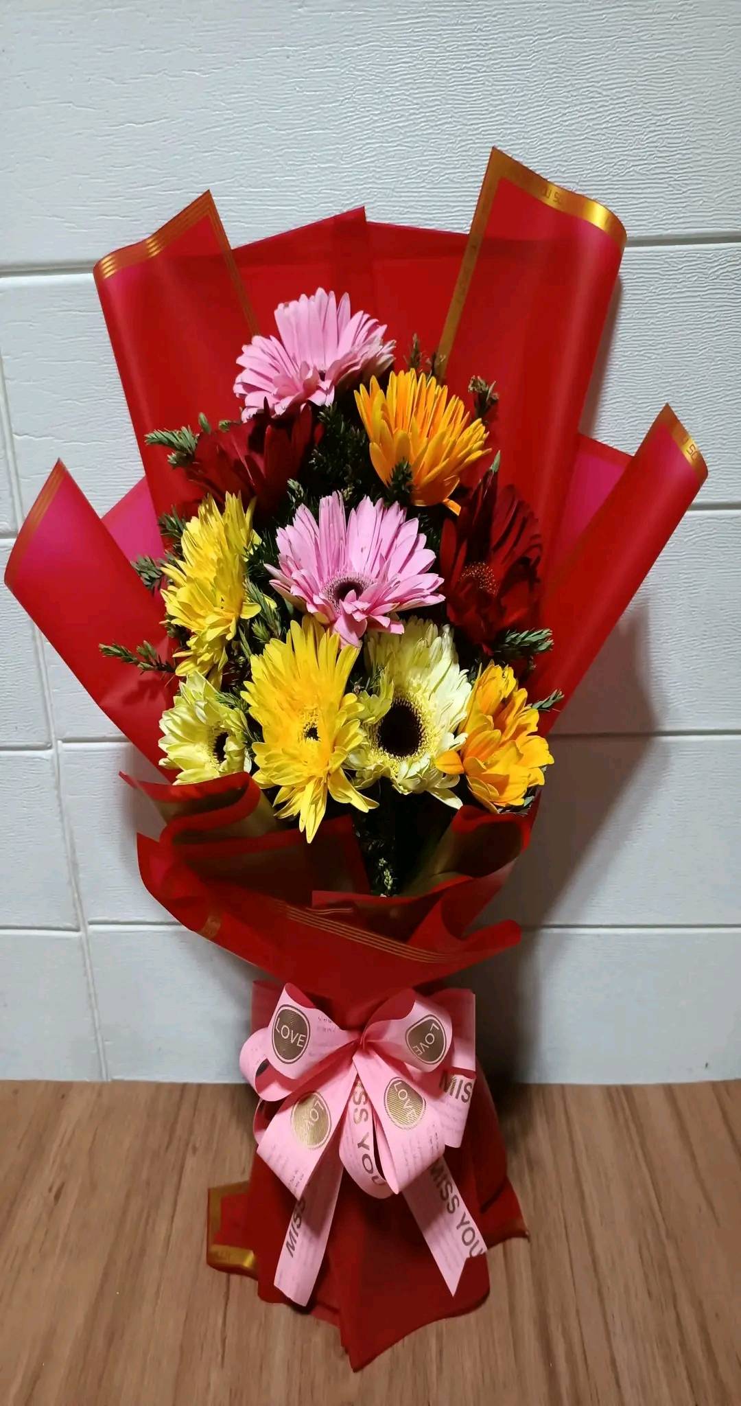 12 Mixed Gerberas Bouquet