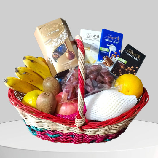 Basket of Lindt Chocolate and Fruits