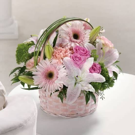 Pink and White Flowers in a Basket