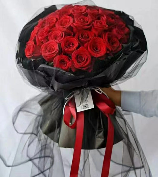 Red roses in a Long mesh