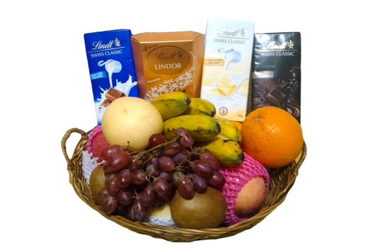 Basket of Lindt Chocolate and Fruits